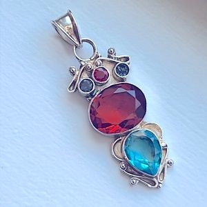 925S Silver Tear Drop and Oval Topaz Pendant